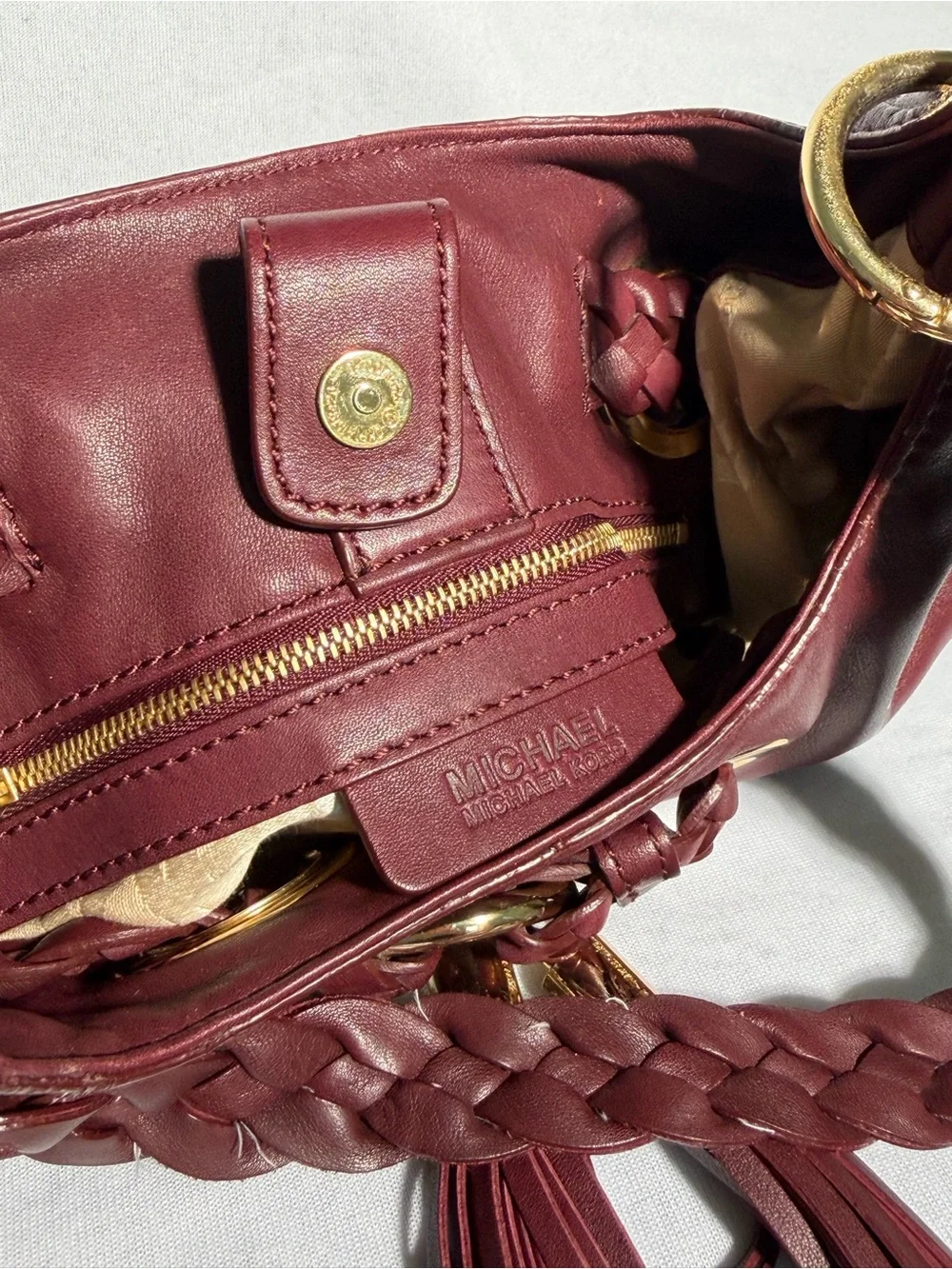 Michael Kors Burgundy Leather Braided Grommet Tassel Shoulder Bag Gold Hardware